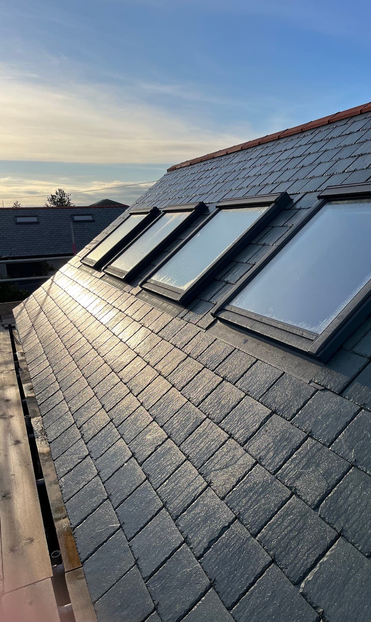 New slate roof with roof windows on a property in Newquay, Cornwall